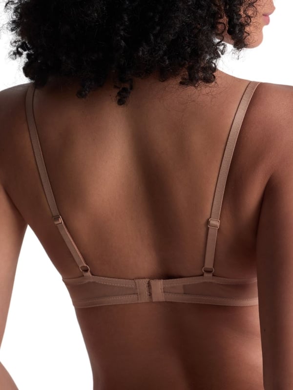 Aubade Sheer Emotion Moulded Push-Up Bra. Underwired plunge bra bra with lightweight moulded cleavage enhancing cups, shimmering fabric, a comfortable semi sheer mesh back, and intricate embroidery. Matching briefs available. This item is recommended for hand wash only.