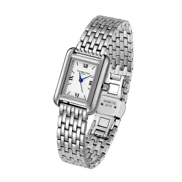 The VICTORIA HYDE LONDON women's watch from the RETRO series combines retro-inspired design with modern functionality. The silver square case, measuring 22 x 29 mm and 7.5 mm thick, is made of eco-friendly copper, giving the watch a timeless look. The silver dial with a fine sand effect and clear mineral crystal ensure excellent legibility. The silver stainless steel strap (7-link bracelet) with a width of 14 mm and a total length of 178.11 mm (including clasp) is adjustable and equipped with a practical double folding clasp. The watch is powered by a precise quartz movement (Miyota Super 2035) and offers 3 ATM water resistance, making it an ideal companion for everyday wear.

Case: Silver square case made of eco-friendly copper, measuring 22 x 29 mm and 7.5 mm thick.

Dial: Silver dial with a sand effect for an elegant appearance.

Strap: Silver stainless steel strap (7-link band) with a width of 14 mm and a total length of 178.11 mm, adjustable with a double folding clasp.

Movement: Precise quartz movement (Miyota Super 2035) for reliable timekeeping.

Water resistance: 3 ATM, suitable for everyday activities such as washing hands or splashing water.

This watch is perfect for women who value stylish design, high-quality materials, and functionality.