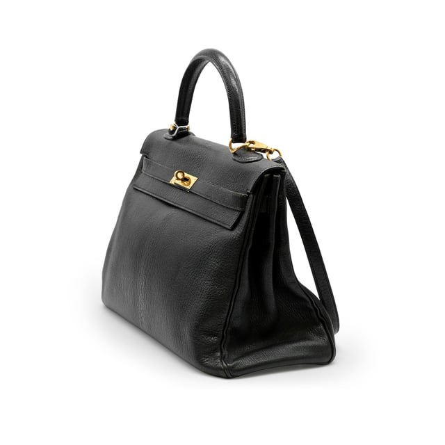 Hermès Kelly 35 Black Leather Bag - '00s VINTAGE, RRP AS NEW
Hermès Kelly 35 bag in black leather with gold hardware. Lined in black leather, it has a zipped pocket on the back and a divided patch pocket on the front.
Remarks: It shows slight signs of wear to the frames and scratches to the hardware. Measurments: width: 12 mm length: 35 mm height: 22 mm