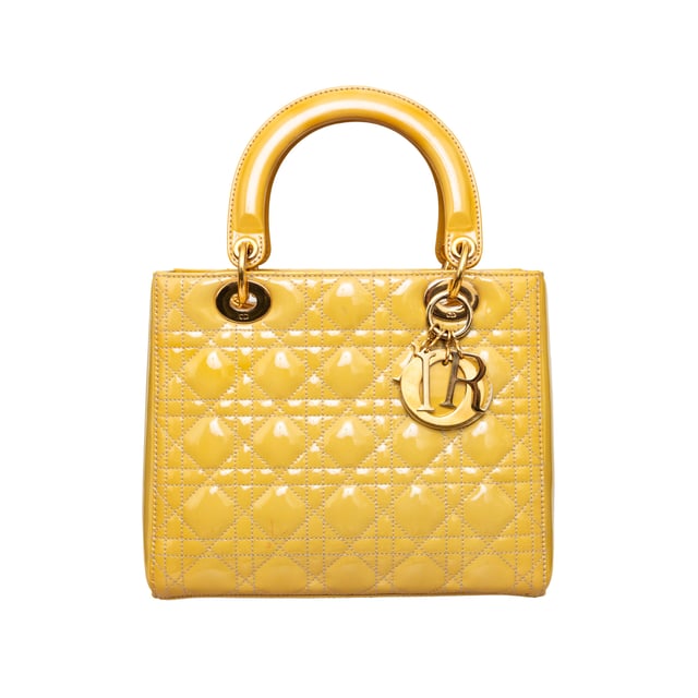 VINTAGE, RRP AS NEW
Crafted in yellow lambskin with Dior's iconic 'Cannage' stitching, this bag features leather top handles, an optional shoulder strap, and silver-toned hardware.
Inclusion: Dust bag.
Remarks: There are some spots on the leather. Measurments:  width: 584 mm height: 482 mm handle drop: 241.3 mm