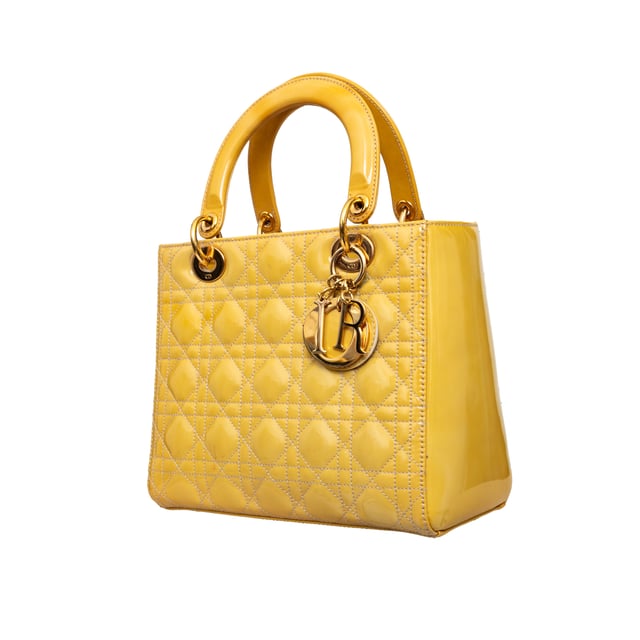 VINTAGE, RRP AS NEW
Crafted in yellow lambskin with Dior's iconic 'Cannage' stitching, this bag features leather top handles, an optional shoulder strap, and silver-toned hardware.
Inclusion: Dust bag.
Remarks: There are some spots on the leather. Measurments:  width: 584 mm height: 482 mm handle drop: 241.3 mm