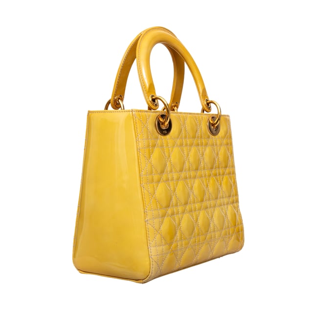 VINTAGE, RRP AS NEW
Crafted in yellow lambskin with Dior's iconic 'Cannage' stitching, this bag features leather top handles, an optional shoulder strap, and silver-toned hardware.
Inclusion: Dust bag.
Remarks: There are some spots on the leather. Measurments:  width: 584 mm height: 482 mm handle drop: 241.3 mm