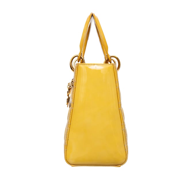 VINTAGE, RRP AS NEW
Crafted in yellow lambskin with Dior's iconic 'Cannage' stitching, this bag features leather top handles, an optional shoulder strap, and silver-toned hardware.
Inclusion: Dust bag.
Remarks: There are some spots on the leather. Measurments:  width: 584 mm height: 482 mm handle drop: 241.3 mm