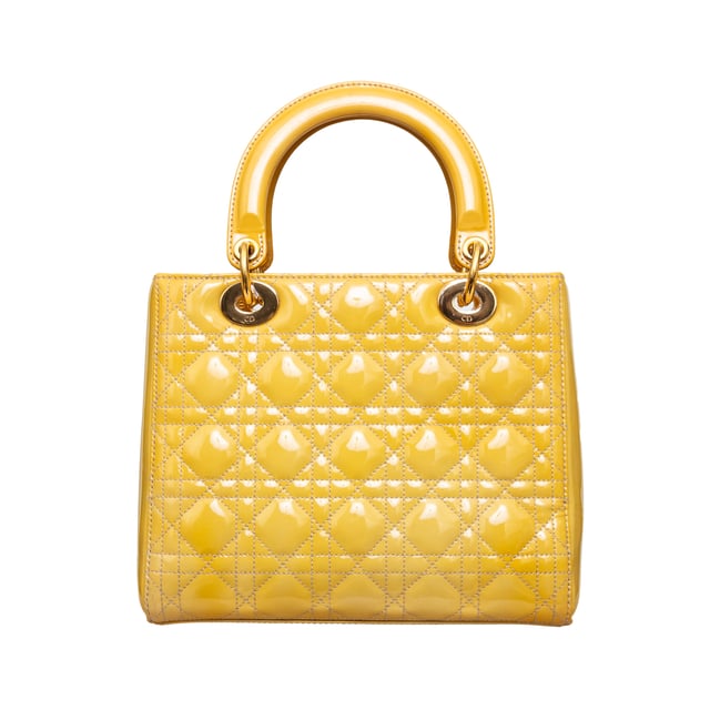 VINTAGE, RRP AS NEW
Crafted in yellow lambskin with Dior's iconic 'Cannage' stitching, this bag features leather top handles, an optional shoulder strap, and silver-toned hardware.
Inclusion: Dust bag.
Remarks: There are some spots on the leather. Measurments:  width: 584 mm height: 482 mm handle drop: 241.3 mm