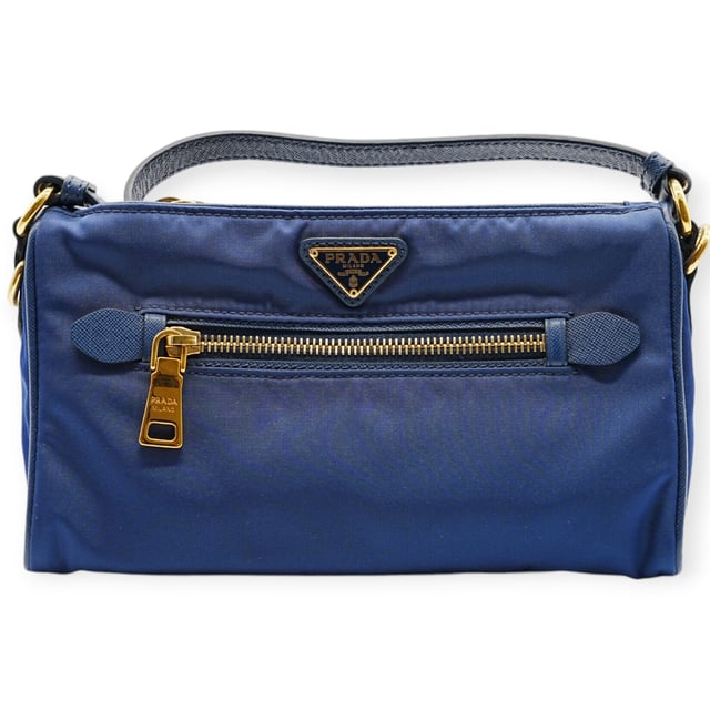 VINTAGE, RRP AS NEW
The Prada Blue Nylon Shoulder Bag features a minimalist design in vibrant blue nylon. Lightweight and functional, it’s perfect for adding a pop of color and modern style to everyday ensembles.
Inclusion: Dustbag, instruction paper
Remarks: Overall no damages 
Assured Product Authenticity: This product is supplied by a renowned and trusted partner.
With this purchase, you are preserving iconic craftsmanship, celebrating heritage, and embracing the beauty of conscious shopping.Measurments:  width: 152 mm length: 584 mm height: 342 mm