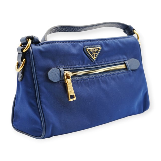 VINTAGE, RRP AS NEW
The Prada Blue Nylon Shoulder Bag features a minimalist design in vibrant blue nylon. Lightweight and functional, it’s perfect for adding a pop of color and modern style to everyday ensembles.
Inclusion: Dustbag, instruction paper
Remarks: Overall no damages 
Assured Product Authenticity: This product is supplied by a renowned and trusted partner.
With this purchase, you are preserving iconic craftsmanship, celebrating heritage, and embracing the beauty of conscious shopping.Measurments:  width: 152 mm length: 584 mm height: 342 mm