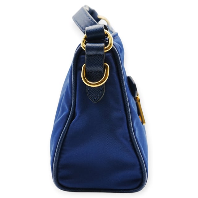 VINTAGE, RRP AS NEW
The Prada Blue Nylon Shoulder Bag features a minimalist design in vibrant blue nylon. Lightweight and functional, it’s perfect for adding a pop of color and modern style to everyday ensembles.
Inclusion: Dustbag, instruction paper
Remarks: Overall no damages 
Assured Product Authenticity: This product is supplied by a renowned and trusted partner.
With this purchase, you are preserving iconic craftsmanship, celebrating heritage, and embracing the beauty of conscious shopping.Measurments:  width: 152 mm length: 584 mm height: 342 mm