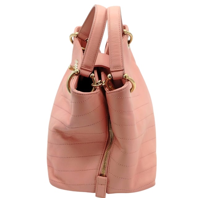 VINTAGE, RRP AS NEW
This refined tote is crafted from chevron-stitched textured calfskin leather in ivory. It features a durable top handle and an adjustable shoulder strap for versatile carrying options. The flap opens to reveal a tonal ivory fabric-lined interior, complete with a central zippered compartment and two open compartments on either side. This elegant bag offers ample space for all your essentials, whether for day or evening, showcasing the timeless craftsmanship and sophistication synonymous with Chanel.
Inclusion: Dustbag 
Remarks: The colors of strap’s ends are damaged  Measurments:  width: 736 mm height: 444 mm strap length: 1244.34 - 1258.26 mm handle drop: 290.81 mm
