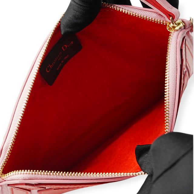 VINTAGE, RRP AS NEW
The Dior Pink Portfolio Shoulder Bag is a slim, elegant piece with a unique design featuring red shapes on the exterior. Crafted in soft pink leather, it includes a delicate shoulder strap, making it a stylish and distinctive accessory for a polished look.
Inclusion: Box, dustbag, Shoulder strap
Remark: Overall no damages 
Assured Product Authenticity: This product is supplied by a renowned and trusted partner.
With this purchase, you are preserving iconic craftsmanship, celebrating heritage, and embracing the beauty of conscious shopping.Measurments:  width: 12 mm length: 546 mm height: 393 mm