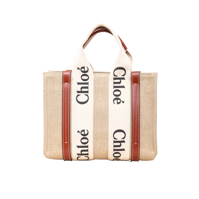 VINTAGE, RRP AS NEW
Effortlessly chic and environmentally conscious, the small Chloé Woody Tote Bag is crafted from lower-impact linen canvas and shiny brown calfskin strips. This compact bag features a roomy unlined interior with a practical leather shoulder strap and can be carried by top handles or as a crossbody on the shoulder.
Inclusion: dust bag, shoulder strap, authenticity card.
Assured Product Authenticity: This product is supplied by a renowned and trusted partner.
With this purchase, you are preserving iconic craftsmanship, celebrating heritage, and embracing the beauty of conscious shopping.Measurments:  width: 80 mm length: 260 mm height: 200 mm handle drop: 100 mm