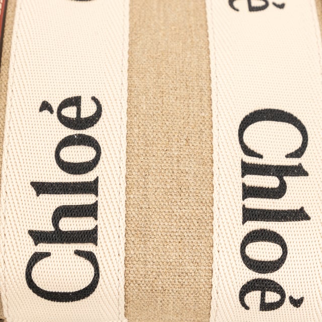 VINTAGE, RRP AS NEW
Effortlessly chic and environmentally conscious, the small Chloé Woody Tote Bag is crafted from lower-impact linen canvas and shiny brown calfskin strips. This compact bag features a roomy unlined interior with a practical leather shoulder strap and can be carried by top handles or as a crossbody on the shoulder.
Inclusion: dust bag, shoulder strap, authenticity card.
Assured Product Authenticity: This product is supplied by a renowned and trusted partner.
With this purchase, you are preserving iconic craftsmanship, celebrating heritage, and embracing the beauty of conscious shopping.Measurments:  width: 80 mm length: 260 mm height: 200 mm handle drop: 100 mm