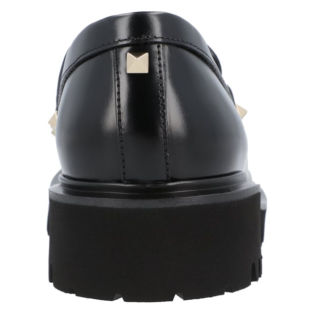 - Rockstud moccasin in calf leather by Valentino Garavani with a rubber lug sole
- Valentino Garavani logo embossed on the tongue and a platinum-plated finish 
- Heel height: 4 cm
- Toe shape: Round toe
- Heel type: Mid heel
- 100% Calf Leather
- Made in Italy Measurments:  height: 40 mm