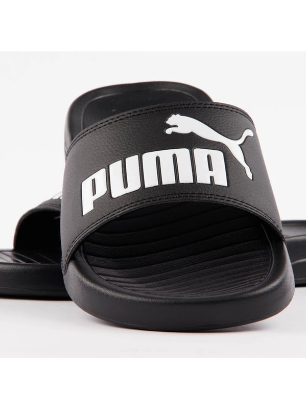 Puma BMW M Motorsport Leadcat Herren Pantoletten Schwarz Synthetik. Authentischer Schuh der Marke Puma - Streetwear/Sportswear Design von Puma - Puma für Herren, modisch und perfekt für den Alltag - Die schwarzen Pantoletten von Puma passen perfekt zu Ihrer restlichen Garderobe - Bequemes Synthetikmaterial - Klassische Schnalle - BMW M Motorsport Leadcat - Synthetik.