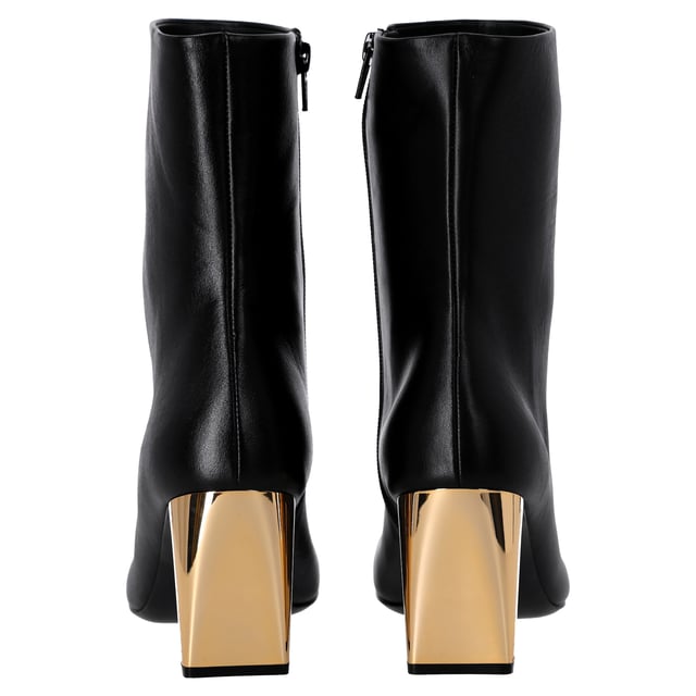 Short black boots embellished with a gold base. Material composition:100% Leather. Season Reference (Collection): Winter 2023