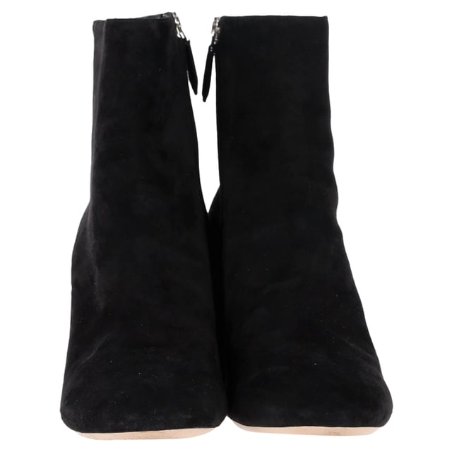 VINTAGE, RRP AS NEW
 The Miu Miu Feather Pearl-Embellished Ankle Boots in Black Suede are a captivating mix of drama and luxury, adorned with delicate pearls and soft feathers for a high-fashion finish. Crafted from plush suede, these boots offer a striking silhouette that effortlessly turns heads. Pair them with a sleek mini dress or tailored shorts to showcase their unique detailing and add a touch of avant-garde elegance to your look.

Miu Miu Feather Pear-Embellished Ankle Boots in Black Suede

Condition: Very good
Signs of wear: Minor markings, Lightly used but very well maintained. Minor mark at soles & creasing, light scuffing at the soles and heels.
Packaging: Dust bag
Color: Black
Material: Suede | suede
Size: IT | 39
Measurements: Heel height: 80; Insole length: 280
SKU: NAPPUGBSH489770W