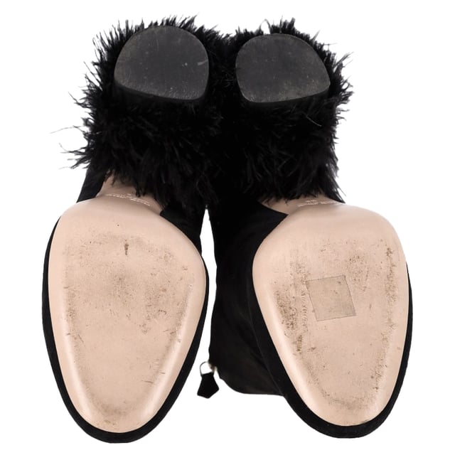 VINTAGE, RRP AS NEW
 The Miu Miu Feather Pearl-Embellished Ankle Boots in Black Suede are a captivating mix of drama and luxury, adorned with delicate pearls and soft feathers for a high-fashion finish. Crafted from plush suede, these boots offer a striking silhouette that effortlessly turns heads. Pair them with a sleek mini dress or tailored shorts to showcase their unique detailing and add a touch of avant-garde elegance to your look.

Miu Miu Feather Pear-Embellished Ankle Boots in Black Suede

Condition: Very good
Signs of wear: Minor markings, Lightly used but very well maintained. Minor mark at soles & creasing, light scuffing at the soles and heels.
Packaging: Dust bag
Color: Black
Material: Suede | suede
Size: IT | 39
Measurements: Heel height: 80; Insole length: 280
SKU: NAPPUGBSH489770W