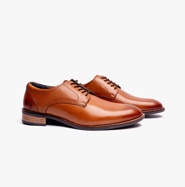 These men's Oxford lace-up shoes feature a leather upper and lining with a synthetic sole, offering comfort and breathability for formal occasions