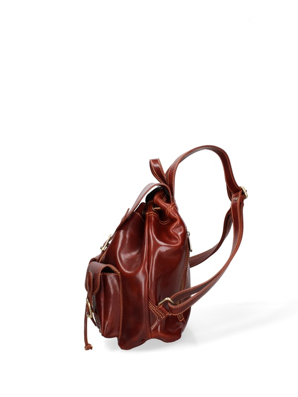 Damen-Umhängetasche mit Leder-Kordelzugverschluss. eine Innentasche mit Reißverschluss und zwei offene Innentaschen. zwei offene Vordertaschen und eine Außentasche mit Reißverschluss hinten. verstellbarer Schultergurt aus Leder. im Ledergriff. ein Innenfach.  Außenmaterial. Innen mit Baumwolle gefüttert. Maße: 32x26x13 cm. Hergestellt in Italien