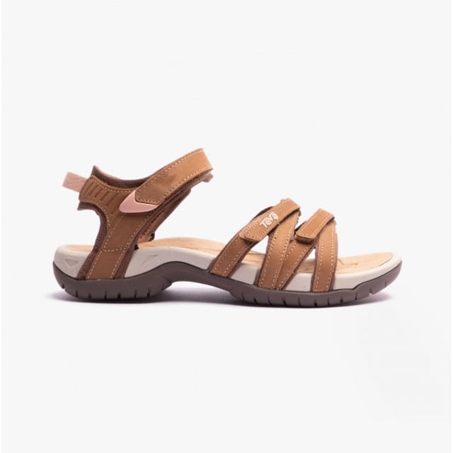 These lightweight, breathable leather sandals feature a cross-strap design with an adjustable touch fasten, a round toe, and a flat heel, ideal for casual wear