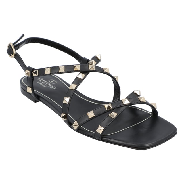 - Rockstud jelly sandals from Valentino Garavani featuring an ankle strap with a side buckle, a branded insole, a T-bar strap, an open toe, and gold-tone studs
- PVC 100%
- Made in: Italy