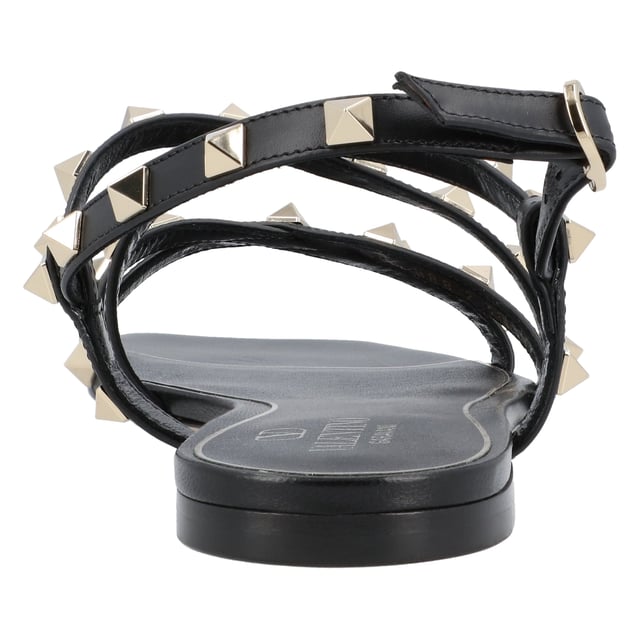 - Rockstud jelly sandals from Valentino Garavani featuring an ankle strap with a side buckle, a branded insole, a T-bar strap, an open toe, and gold-tone studs
- PVC 100%
- Made in: Italy