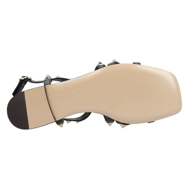 - Rockstud jelly sandals from Valentino Garavani featuring an ankle strap with a side buckle, a branded insole, a T-bar strap, an open toe, and gold-tone studs
- PVC 100%
- Made in: Italy