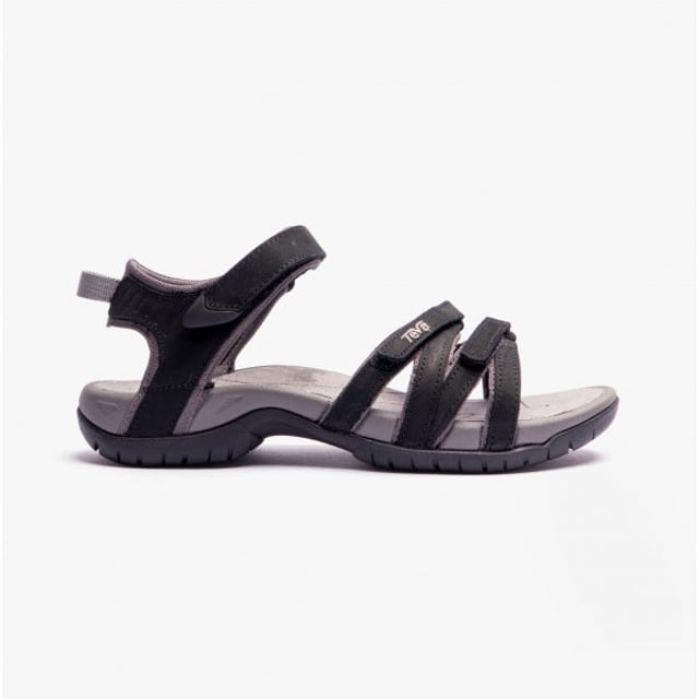 These women's strappy sandals feature a leather upper, textile lining, and rubber sole with adjustable touch fasten for comfort and breathability, ideal for casual wear