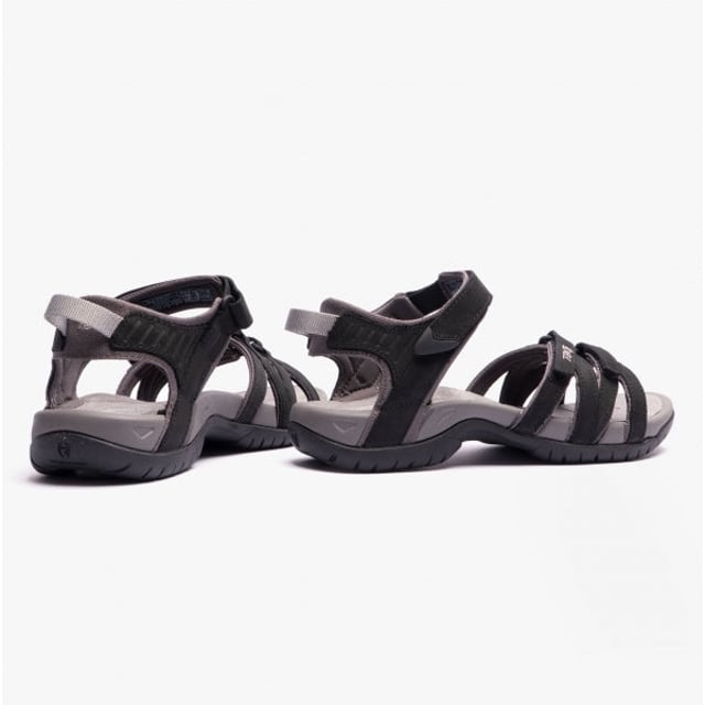 These women's strappy sandals feature a leather upper, textile lining, and rubber sole with adjustable touch fasten for comfort and breathability, ideal for casual wear