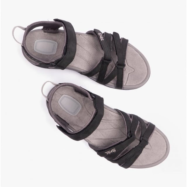 These women's strappy sandals feature a leather upper, textile lining, and rubber sole with adjustable touch fasten for comfort and breathability, ideal for casual wear