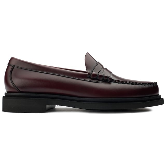 Change up your footwear game with the Step Larson Penny Loafer from G.H.Bass, a black leather treasure handcrafted exclusively with G.H.Bass's traditional hand-sewing techniques. The shoes are defined by innovative step welt detailing that merges the sole with the upper, giving the loafers a new elevated profile. A new sophisticated design with a literal modern edge provides added grip, durability, comfort, and style.