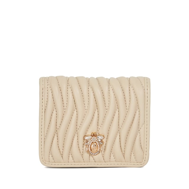 Keep your essentials cute and organised with Kaci, our expertly crafted quilted leather purse adorned with our branded Dune Bug embellishment. Designed with a popper fastening and an internal zip pocket, there's plenty of space to store your coins and cards.