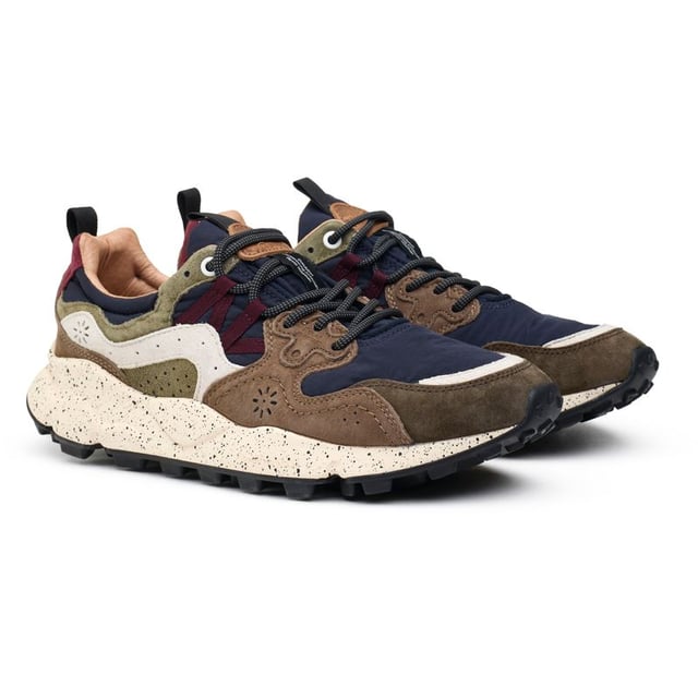 Add some pep to your sporty looks with these unmissable, unusual trainers Yamano 3 from Flower Mountain. The running-style sneaker has a super soft suede and nylon upper and a funky, chunky sole. The intricate stitching, beautiful multicolour design and woven details make for a snug fit and fabulous, unique look.