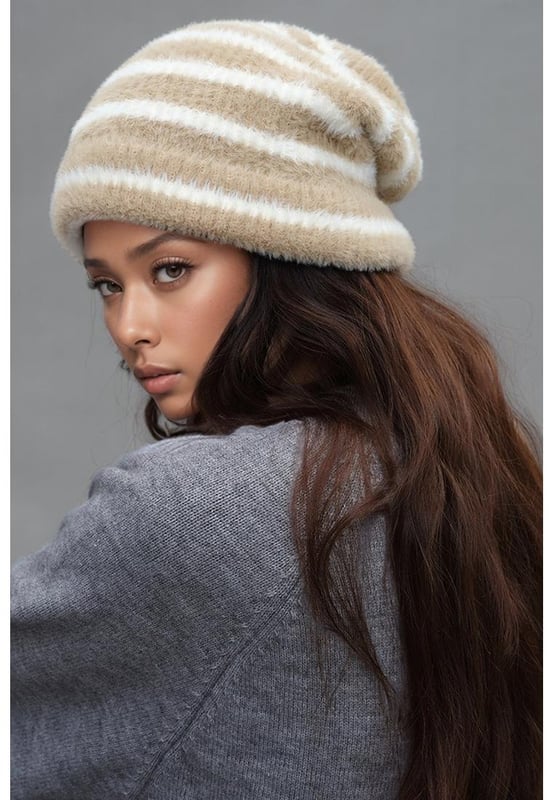 Product: Fuzzy Contrast Striped Thermal Hat
  Pieces: 1
  piece
  Material: Nylon
  Imported
  Actual Height: 10.2 inches
  Actual Width: 10.2 inches
  Gender: Women