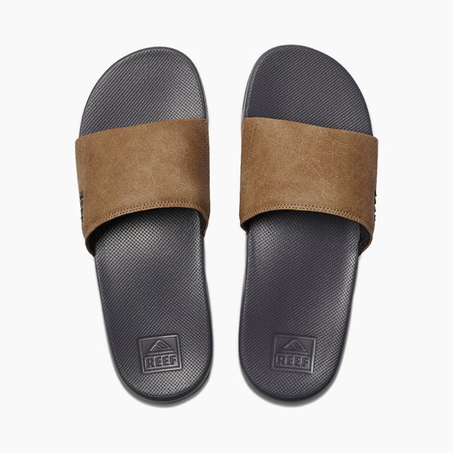 These men's slip-on sliders feature faux leather uppers, breathable synthetic lining, and rubber soles for comfort and durability, ideal for casual wear