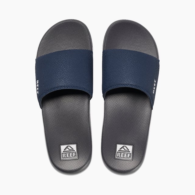 These lightweight slip-on sliders feature a synthetic upper, textile lining, and EVA sole for comfort and breathability, ideal for casual wear