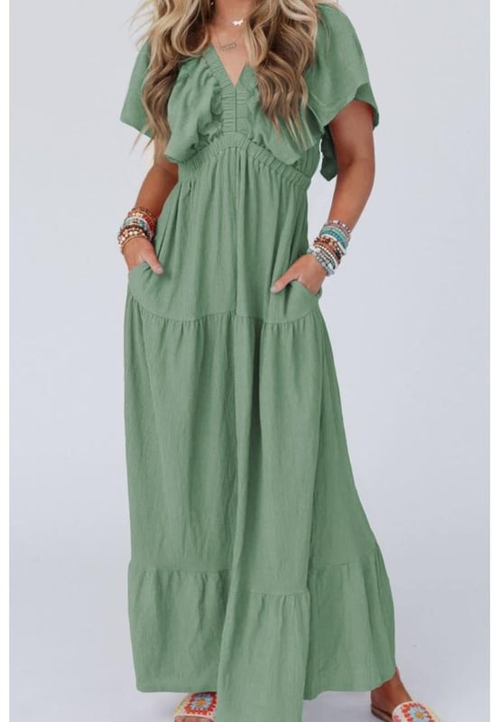 Ruffled V Neck Flutter Sleeve Maxi Dress
  Tied ruffled design
  Sheer: Opaque
  No stretch
  Body: Not lined
  Material composition: 65% viscose 35% polyester
  Care instructions: Machine wash cold. Tumble dry low.
  Imported