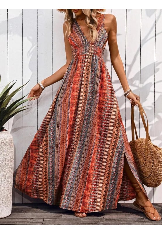 Slit design
  Tied back
  Smocked detailing
  No stretch
  Not lined
  Material composition: 100% polyester
  Care instructions: Machine wash cold tumble dry low
  Imported
  Product Measurements (Measurements by inches) & Size Conversion:
  Size US Length Bust
  S 4 53.5 37.4
  M 6/8 53.9 39
  L 10/12 54.3 41.3
  XL 14 54.7 43.7