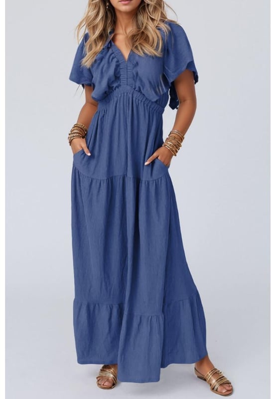 Vestido maxi de manga corta con escote en V y volantes  
Diseño anudado y con volantes  
Tejido opaco para una cobertura completa  
Composición del material: 65% viscosa, 35% poliéster  
Lavar a máquina en frío y secar a baja temperatura  
Importado  
Disponible en tallas S a 2XL