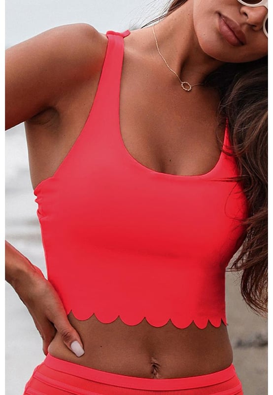 Product: Crisscross Scoop Neck Swim Top
  Features: Crisscross design
  Chest pad: Removable padding
  Underwire: No underwire
  Stretch: Stretchy
  Material composition: 82% polyamide 18% elastane
  Care instructions: Machine wash cold tumble dry low
  Imported