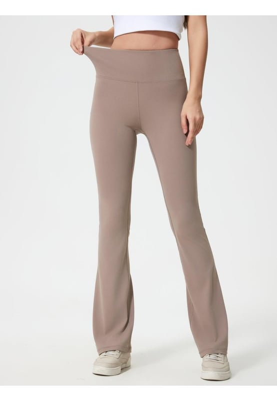 Basic style
  Highly stretchy
  Material composition: 80% nylon 20% spandex
  Care instructions: Machine wash cold tumble dry low
  Imported
  Product measurements by size (in inches):
  Size 4: Bottom Length 41.3 Waist 22.4 Hip 29.1
  Size 6: Bottom Length 41.7 Waist 24 Hip 30.7
  Size 8: Bottom Length 42.1 Waist 25.6 Hip 32.3
  Size 10: Bottom Length 42.5 Waist 27.2 Hip 33.9
  Size 12: Bottom Length 42.9 Waist 28.7 Hip 35.4