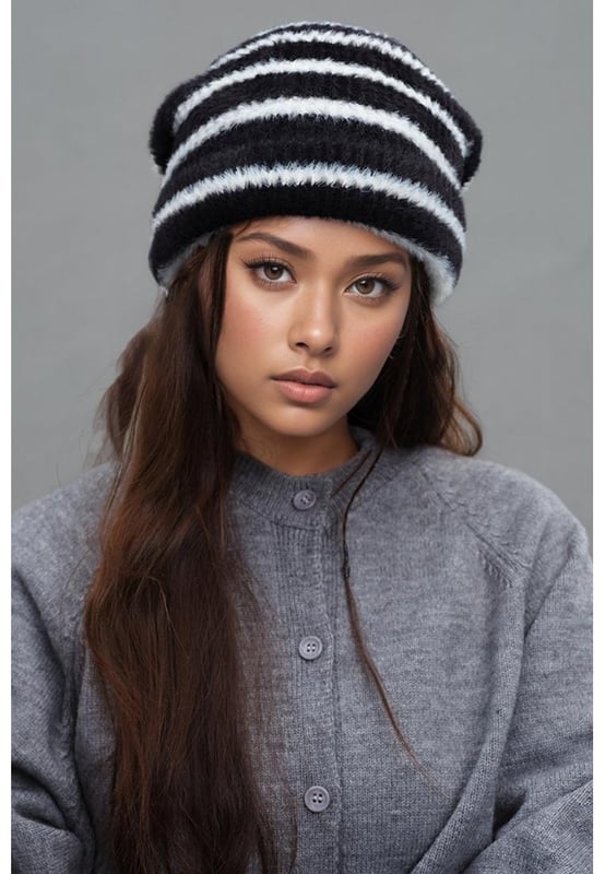 Product: Fuzzy Contrast Striped Thermal Hat
  Pieces: 1
  piece
  Material: Nylon
  Imported
  Actual Height: 10.2 inches
  Actual Width: 10.2 inches
  Gender: Women