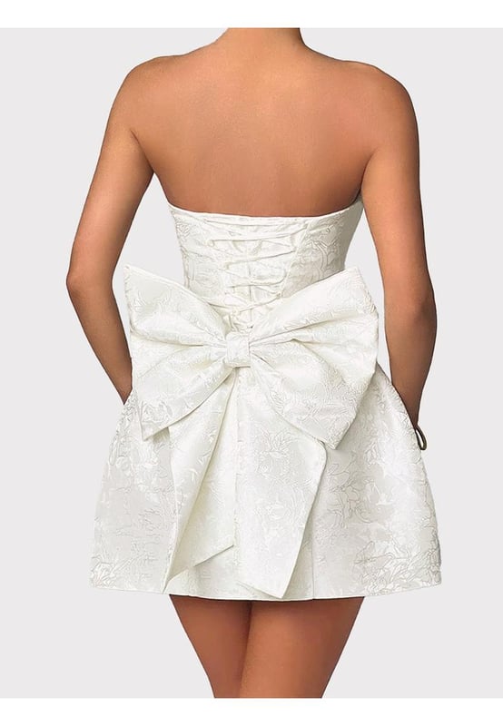Lace
  Up Sleeveless Satin Mini Dress with Bow
  Features: Bow Lace
  Up
  Sheer: Opaque
  Stretch: No stretch
  Body: Not lined
  Material composition: 100% polyester
  Care instructions: Machine wash cold tumble dry low
  Imported
  Product Measurements (Measurements by inches) & Size Conversion
  Size: US
  S: Length 25 Bust 30.7 Waist 27.2
  M: Length 25.4 Bust 32.3 Waist 28.7
  L: Length 26 Bust 34.6 Waist 31.1
  XL: Length 26.6 Bust 37 Waist 33.5
