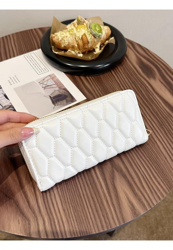 Bag size: Small
  Material: PU leather
  Imported
  Product Measurements (inches):
  Width: 3.9
  Height: 1.2
  Length: 7.7