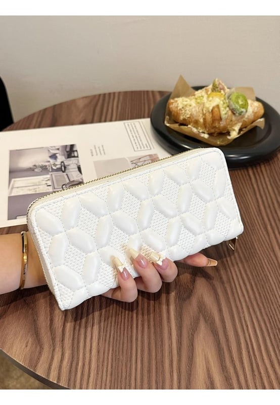 Bag size: Small
  Material: PU leather
  Imported
  Product Measurements (inches):
  Width: 3.9
  Height: 1.2
  Length: 7.7