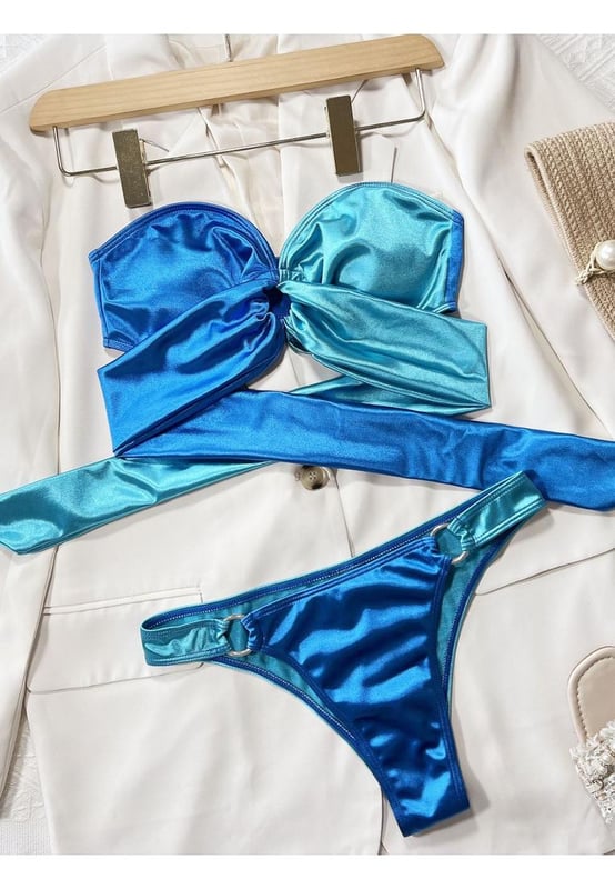 No underwire top
  Two
  piece set
  Removable padding
  Contrast pattern
  Sexy and beach style
  Grommet detailing
  82% polyester 18% elastane
  Highly stretchy
  Machine wash cold tumble dry low
  Imported
  Available in sizes S M L
Material: Shiny Fabric