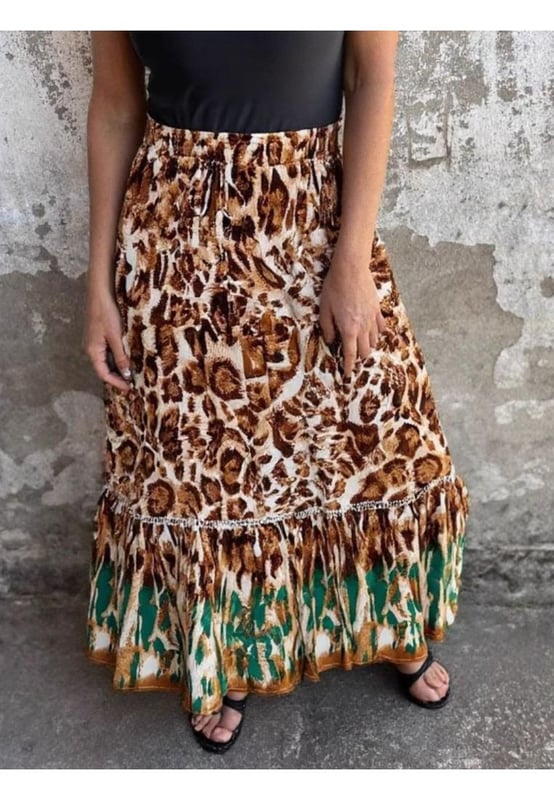 Ruffled design
  Opaque sheer finish
  100% polyester
  Machine wash cold
  Tumble dry low
  Imported
  Available in sizes S to XL
  Size S: Length 34.6 inches Waist 25.2 inches
  Size M: Length 35 inches Waist 26.8 inches
  Size L: Length 35.4 inches Waist 29.1 inches
  Size XL: Length 35.8 inches Waist 31.5 inches
Material: Rayon