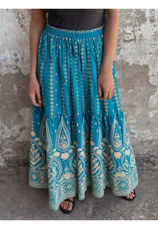 Ruffled design
  Opaque sheer finish
  100% polyester
  Machine wash cold
  Tumble dry low
  Imported
  Available in sizes S to XL
  Size S: Length 34.6 inches Waist 25.2 inches
  Size M: Length 35 inches Waist 26.8 inches
  Size L: Length 35.4 inches Waist 29.1 inches
  Size XL: Length 35.8 inches Waist 31.5 inches
Material: Rayon