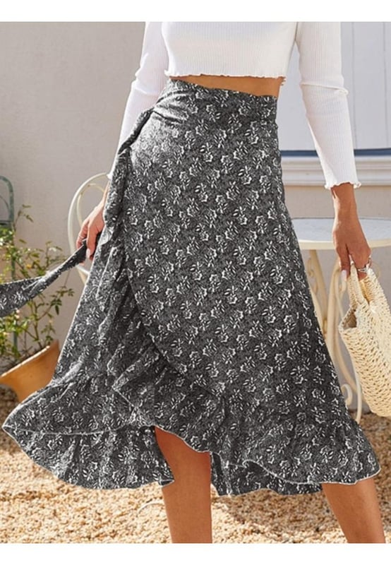 Tied waist
  Ruffled hem
  High
  low design
  Opaque finish
  100% polyester
  Machine wash cold
  Tumble dry low
  Imported
Material: Polyester