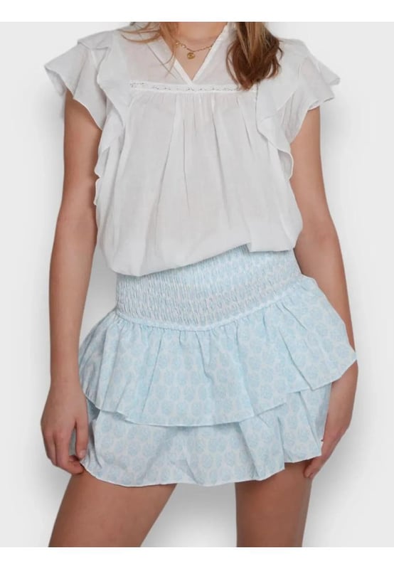 Layered Mini Skirt
  Features layered ruched smocked and ruffled design
  Body not lined
  Material composition: 65% polyester 35% cotton
  Care instructions: machine wash cold tumble dry low
  Imported
  Product Measurements (in inches):
  Size S: US 2/4 Length 14.6 Waist 22
  Size M: US 6/8 Length 15 Waist 23.6
  Size L: US 10 Length 15.4 Waist 25.2