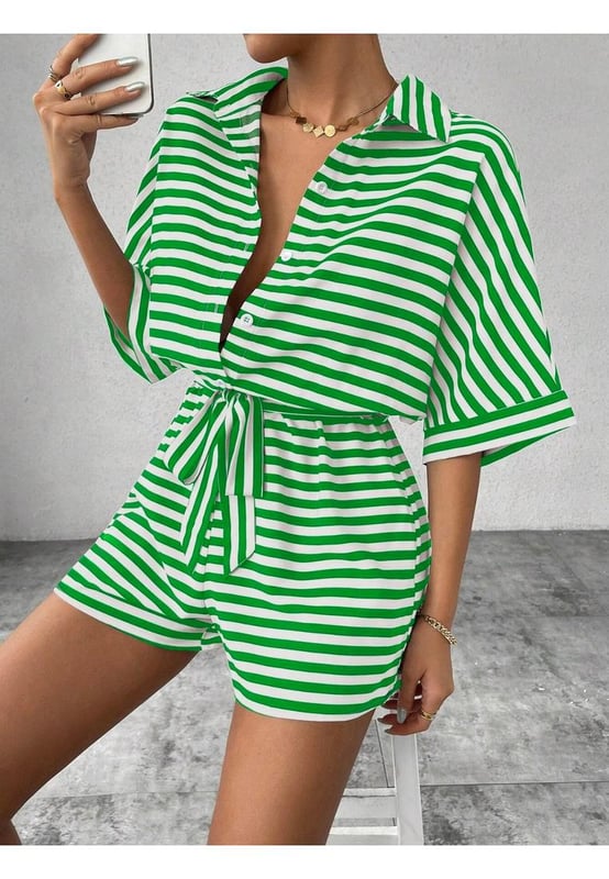 Buttoned front
  Tied waist
  Opaque fabric
  Material composition: 95% polyester 5% elastane
  Care instructions: Machine wash cold tumble dry low
  Imported